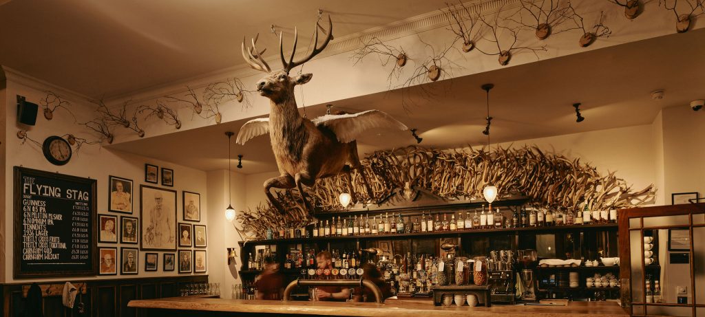 The Flying Stag hung above the bar in the Flying Stag pub, imagined by artist James Prosek