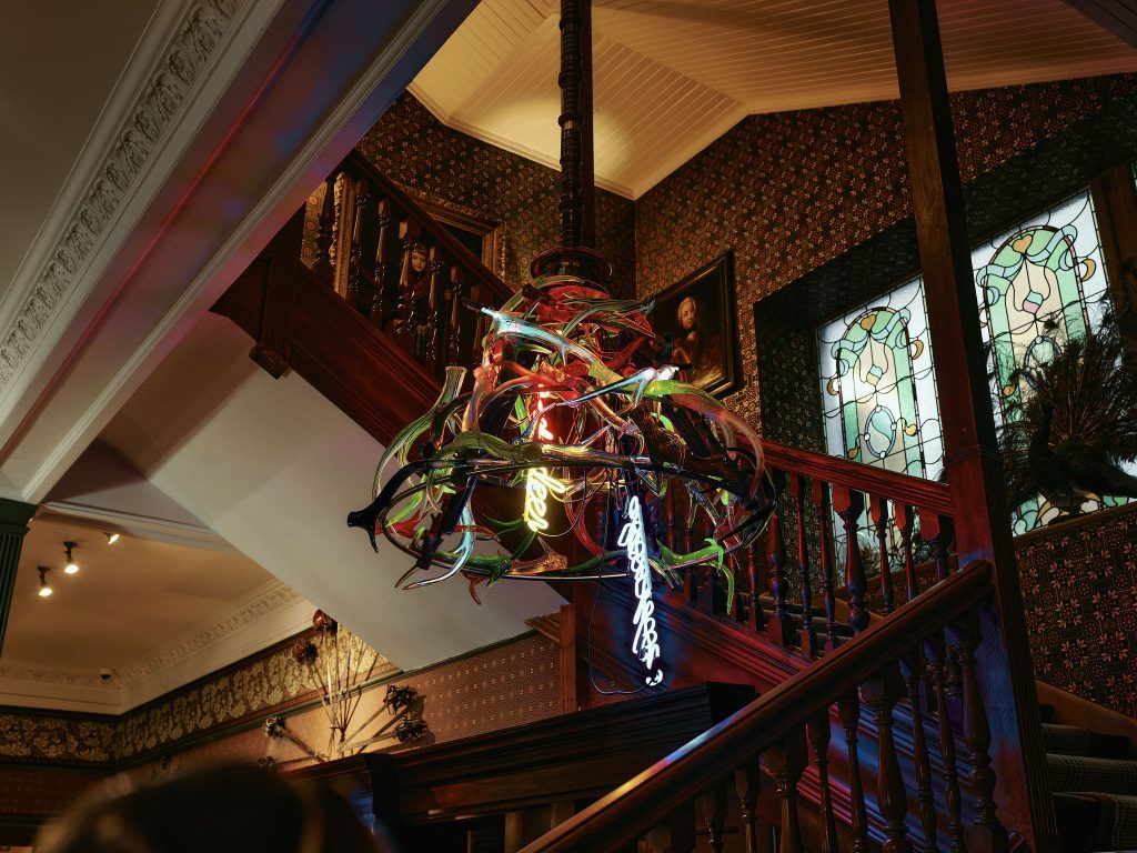 The Richard Jackson 'Red Deer Chandelier' on view in the hotel reception