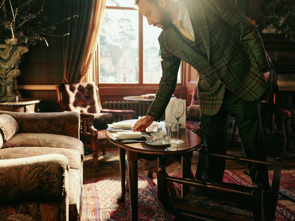 Hotel team member serving afternoon tea