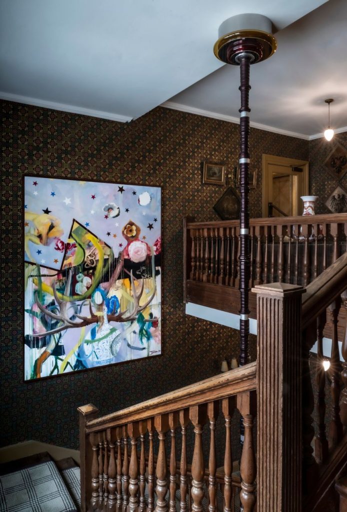 A contemporary painting in the staircase at the Fife Arms