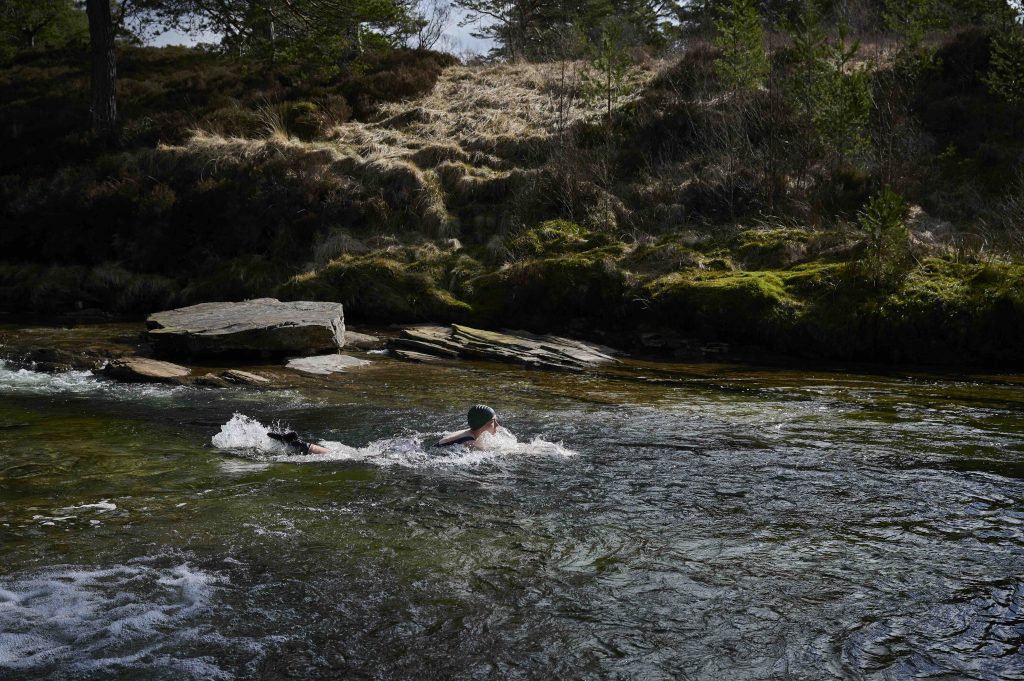A wild swimmer in the river Dee
