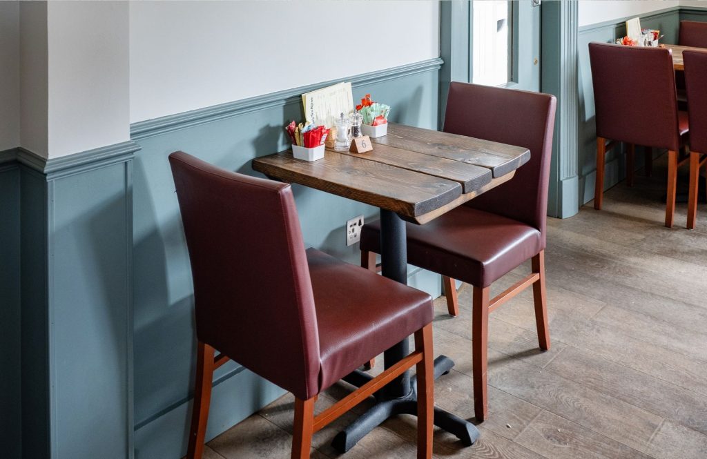 A table and chairs in Gordon's Tea Room