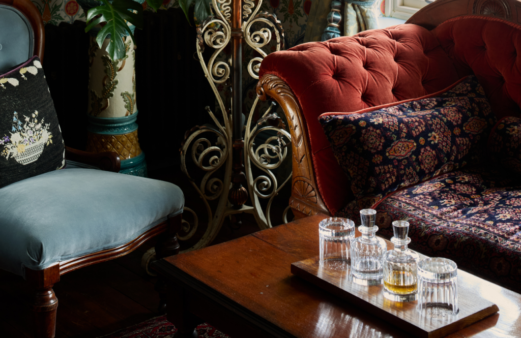 King Edward VII suite detail of a bottle of whisky in sitting area