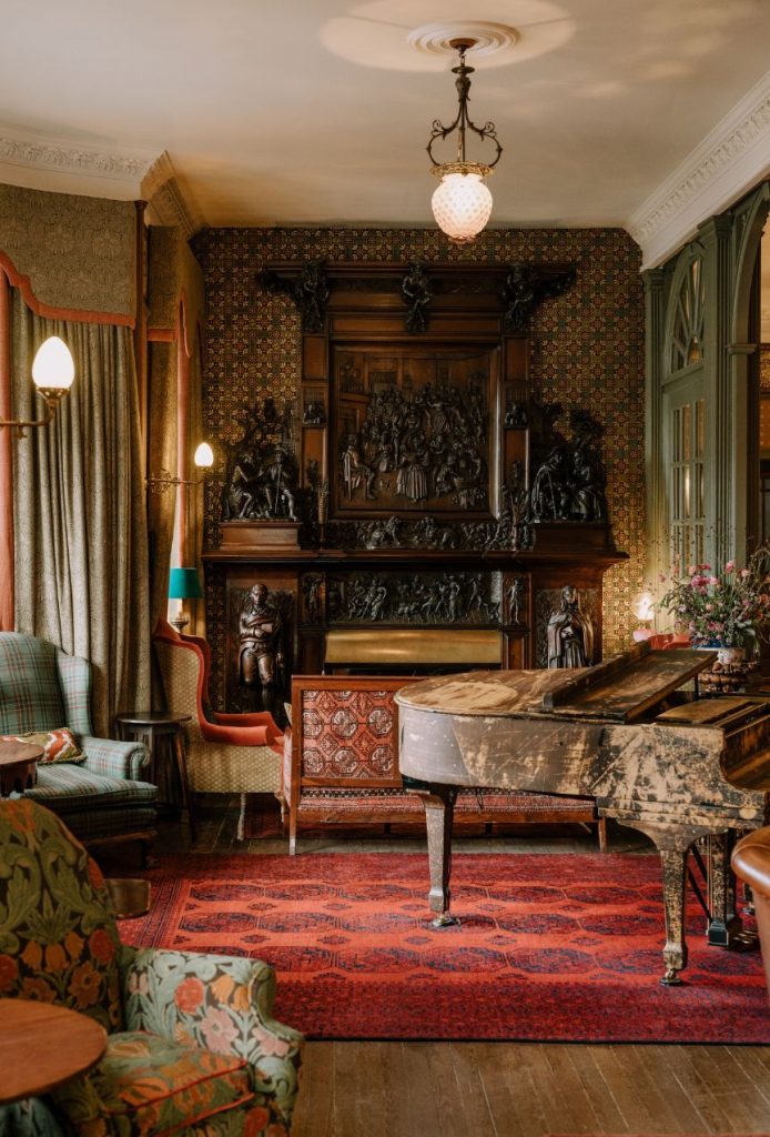 The Steinway piano and Burns Chimney-Piece in the Fife Arms lobby