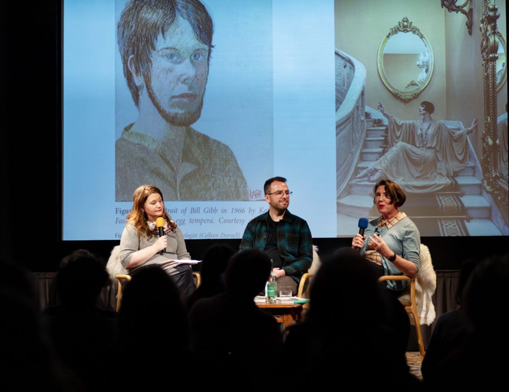 A talk on Bill Gibb, fashion designer at Festival of Fashion with three speakers on the stage