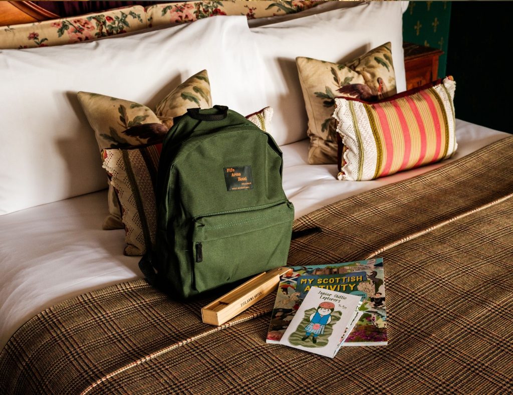 Children's activity backpack on the bed at the Fife Arms