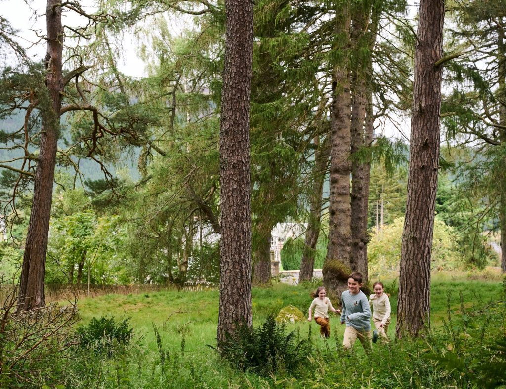 Children running around the village of Braemar