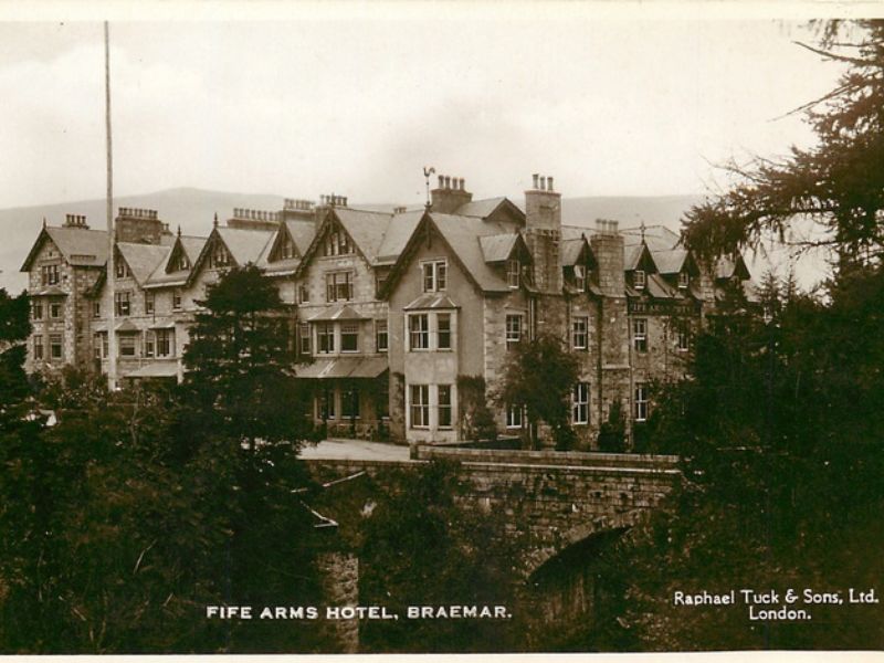 Exterior of the Fife Arms hotel with the Clunie Bridge in the foreground
