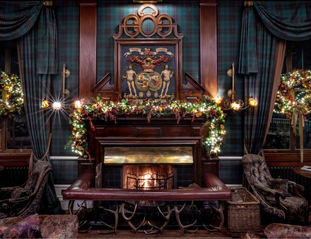 A festive garland on the fireplace in the Fife Arms Drawing Room